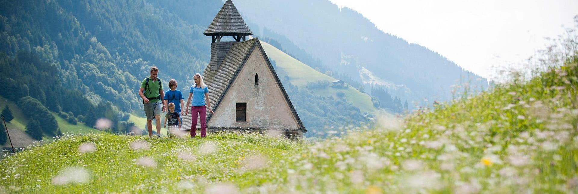 A family is visiting Tre Chiese near Barbiano